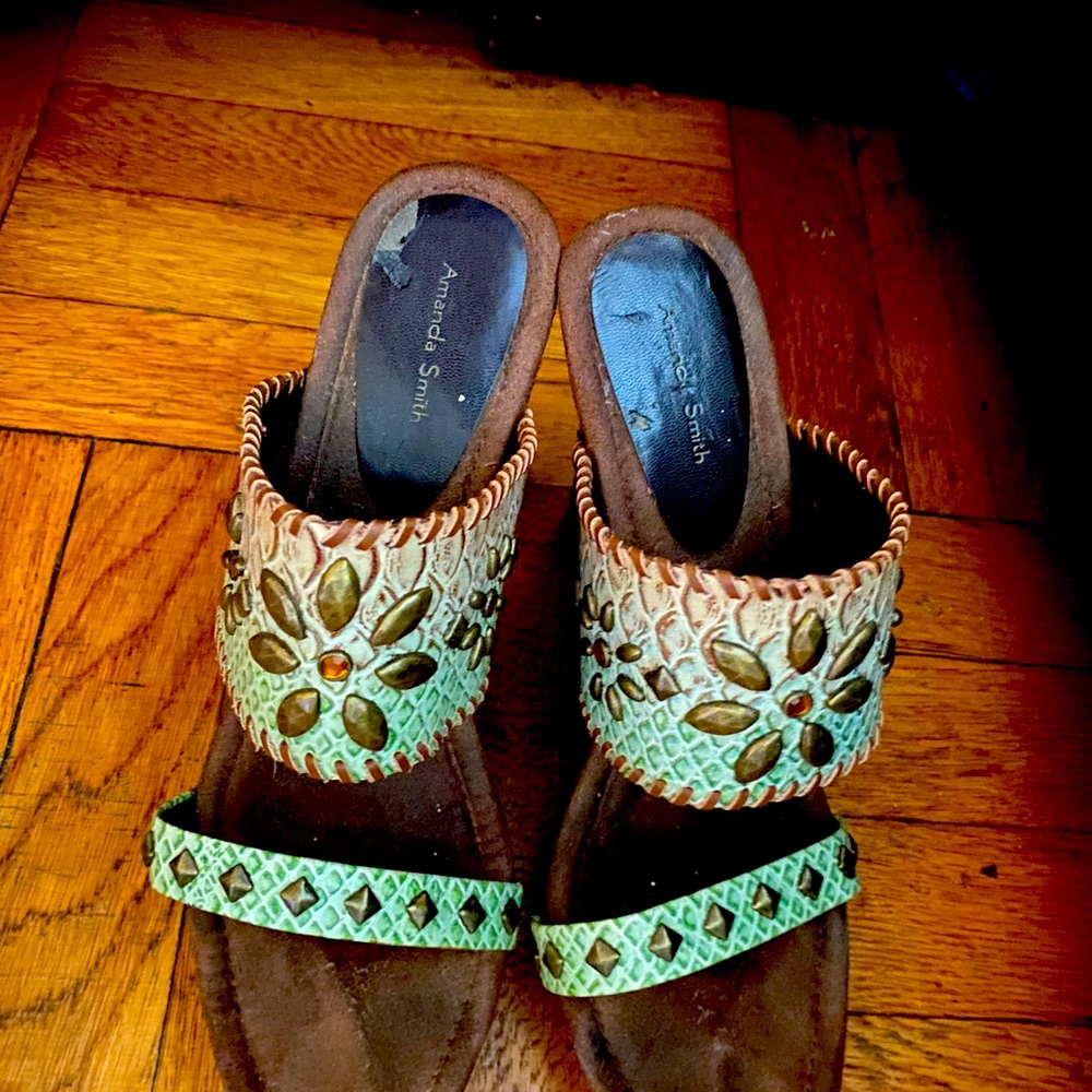 Platform high heeled sandals with teal and green colors and metal studs